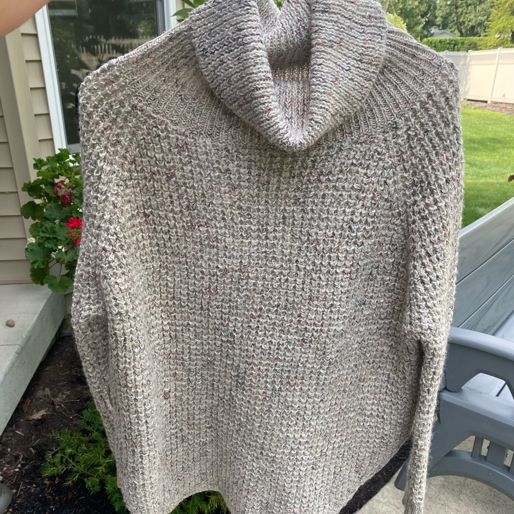 Free People oversized beige turtleneck sweater